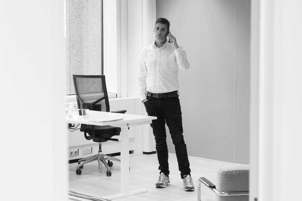 Bas Veldhuis on the phone in the office
